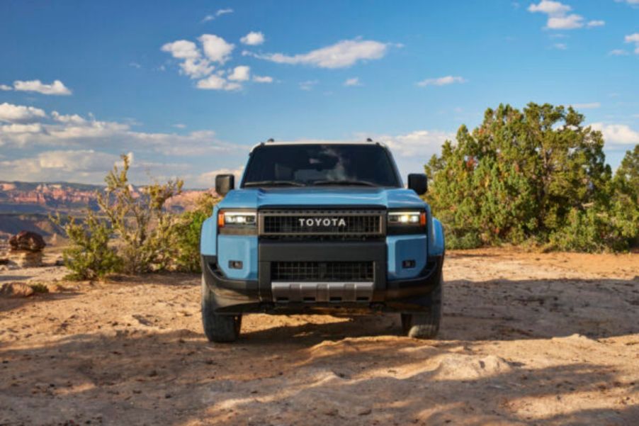 A front-view of a blue 2024 Toyota Land Cruiser.