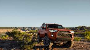 The 2024 Toyota 4Runner driving off-road.