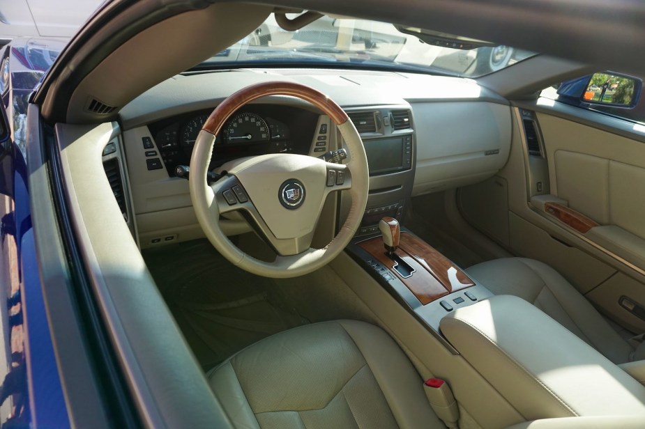 The interior of a Cadillac XLR parked at a car show.