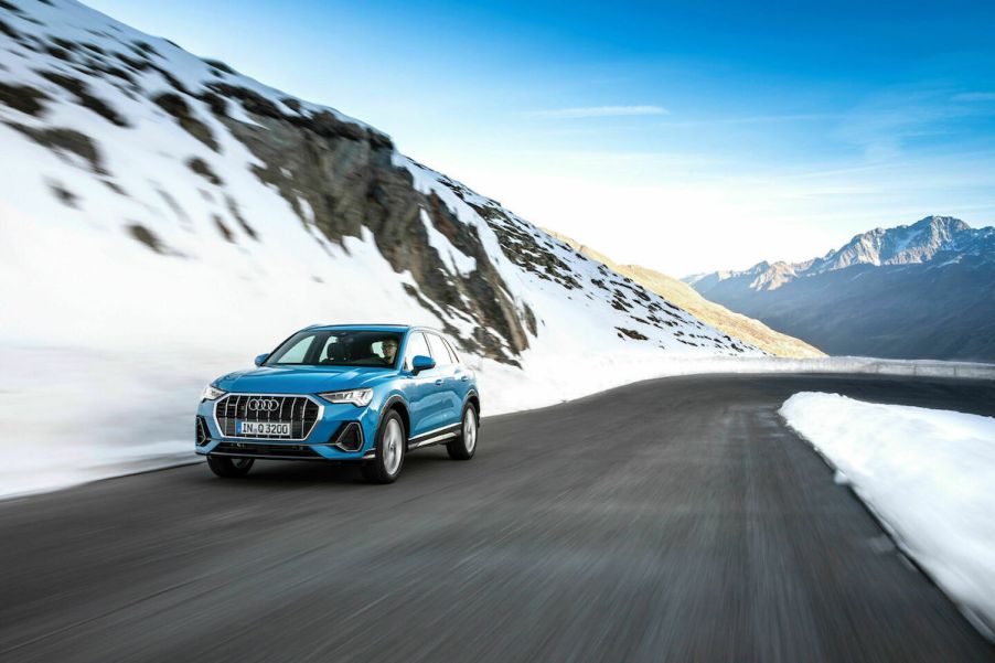 The Audi Q3 driving on a mountain road