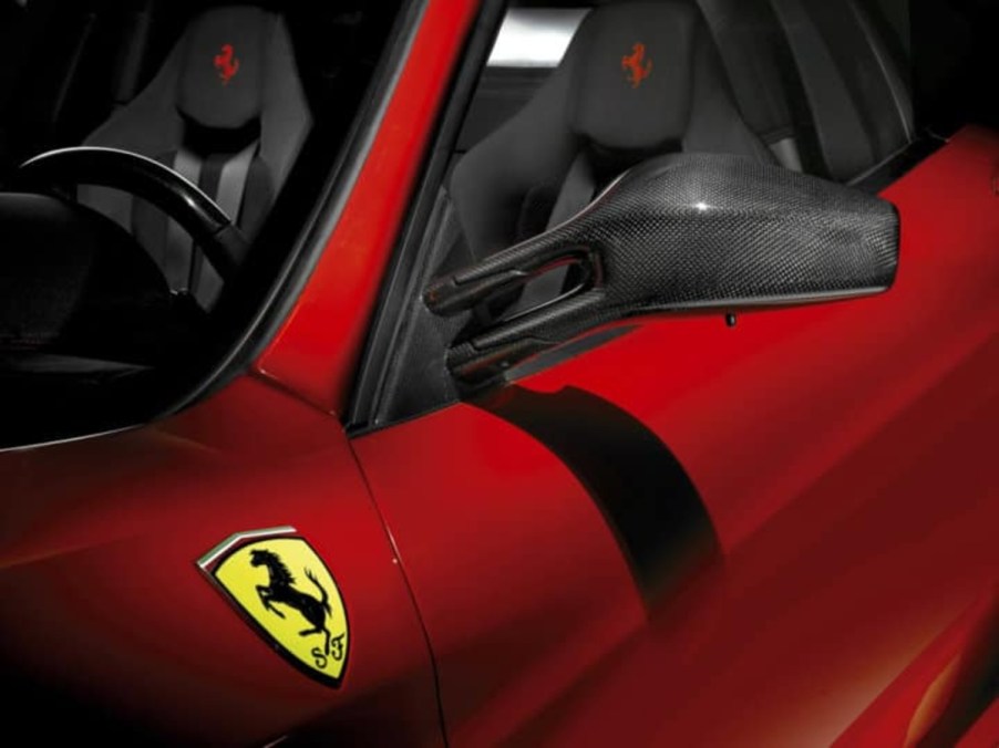 Red 2007 Ferrari F430 Scuderia prancing horse logo.