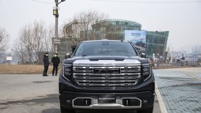 A black GMC Sierra Denali parked in front of the venue for GM Korea Co.'s launch event in Seoul. The GMC Sierra Elevation is a good bargain buy.