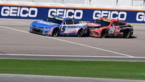 Kyle Larson races Joe Gibbs Racing driver Christopher Bell.