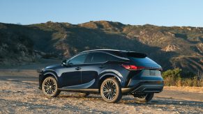 2023 Lexus RX 350 in blue parked in the desert. The RX is the most dependable vehicle in 2023.