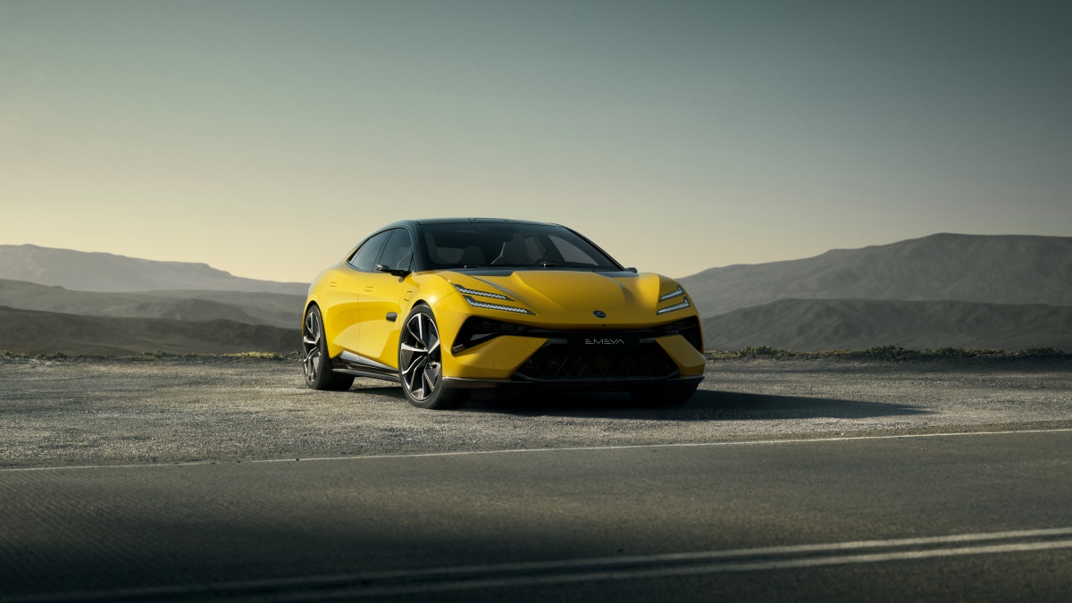 A yellow 2025 Lotus Emeya four door GT car