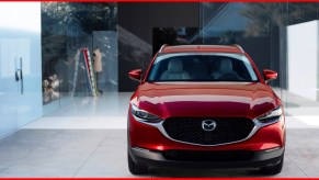 A red 2023 Mazda CX-30 subcompact SUV is parked.