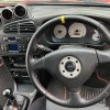 Black interior of 1996 Mitsubishi Lancer Evolution Rally homologation car