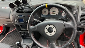 Black interior of 1996 Mitsubishi Lancer Evolution Rally homologation car