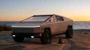 The Tesla Cybertruck on the beach near dusk