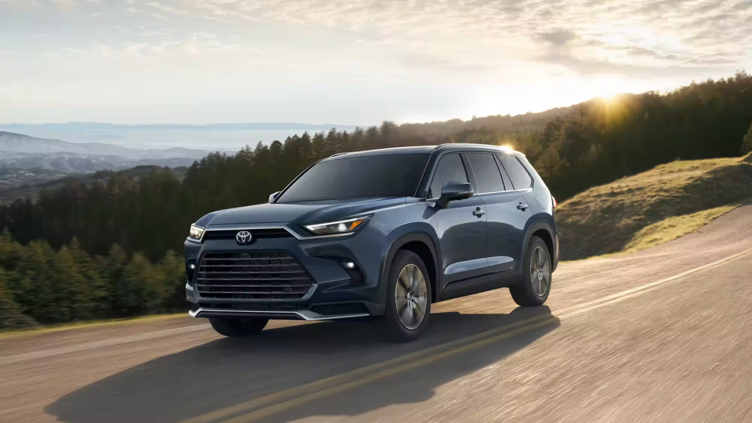 The 2024 Toyota Grand Highlander Hybrid Max driving