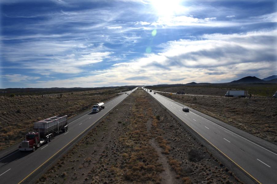 Trucks and cars on a divided Interstate Highway