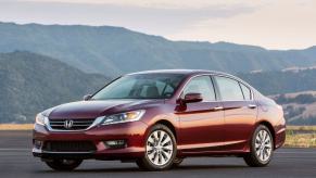 A 2014 Honda Accord EX-L midsize sedan model with a V6 engine