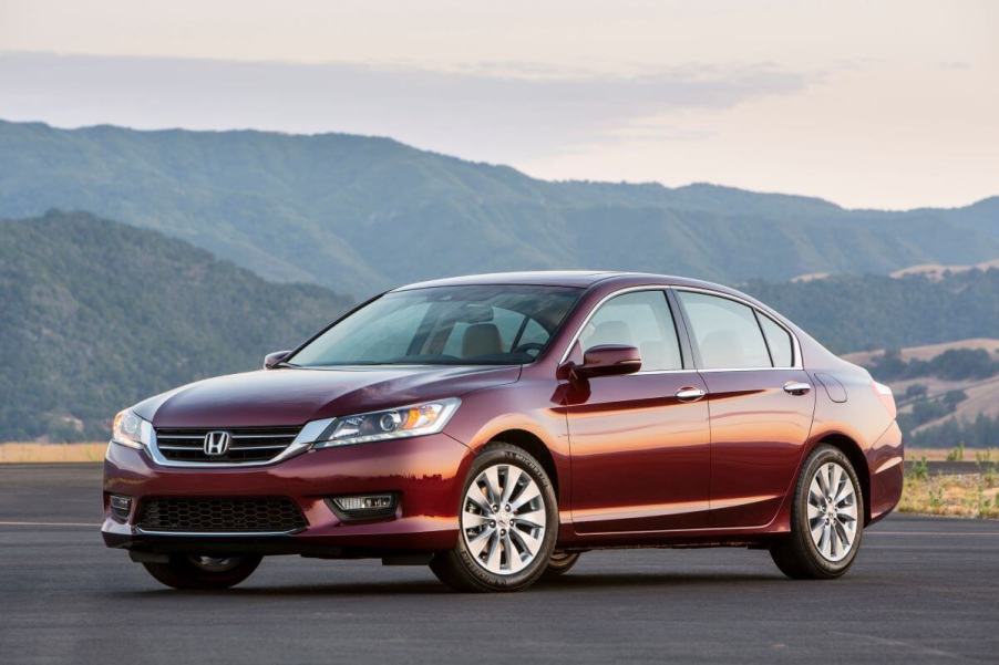 A 2014 Honda Accord EX-L midsize sedan model with a V6 engine