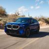 The first-ever BMW XM luxury plug-in hybrid electric vehicle SUV model in Marina Bay Blue Metallic