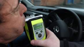 A driver takes a breathalyzer test