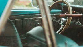 View through the window of a locked Mustang car.