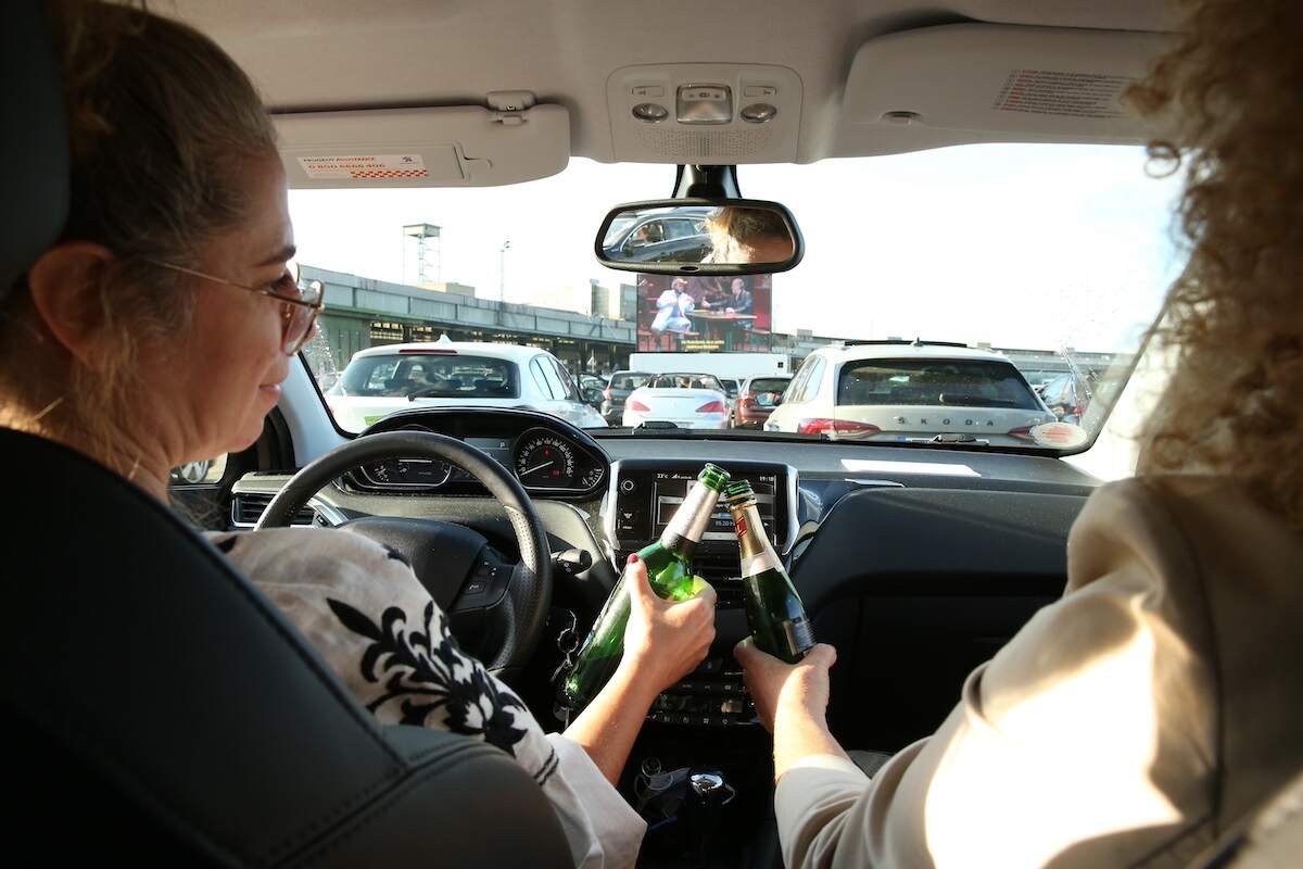 Can you drive with an open but empty beer in your car?