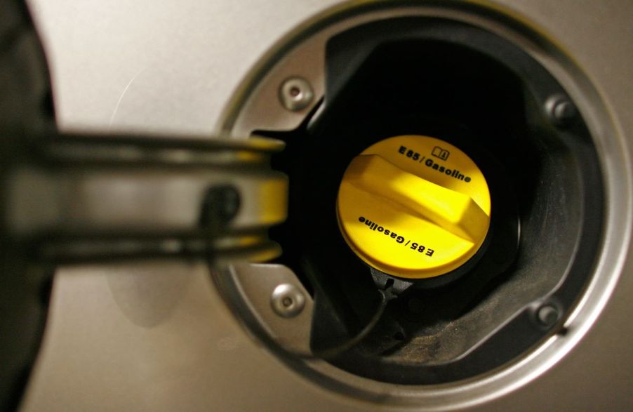 A yellow E85/Gasoline cap on a 2007 Chevy Impala model from a Washington D.C. Enterprise fleet