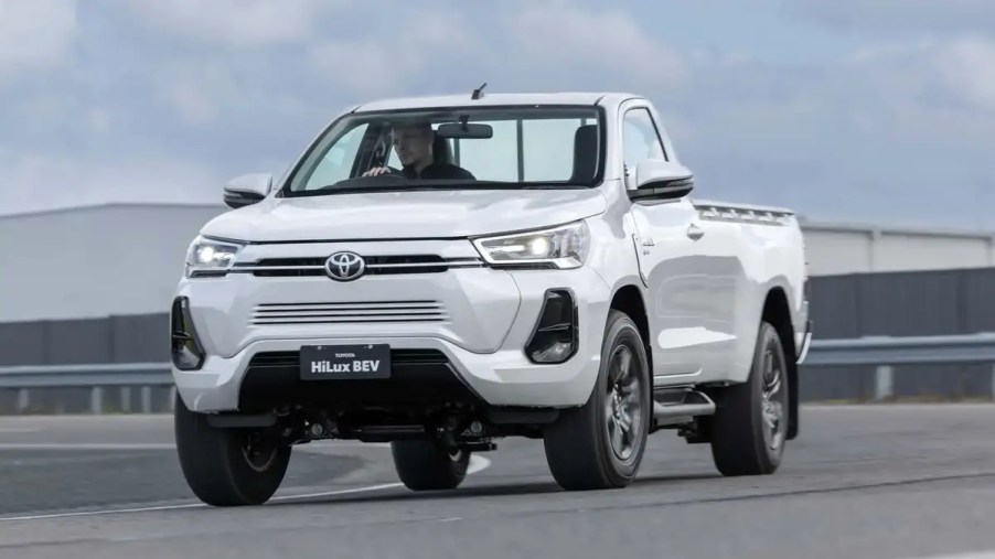 White Toyota Hilux REVO BEV concept in motion