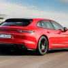 Red 2023 Porsche Panamera Sport Turismo on the track