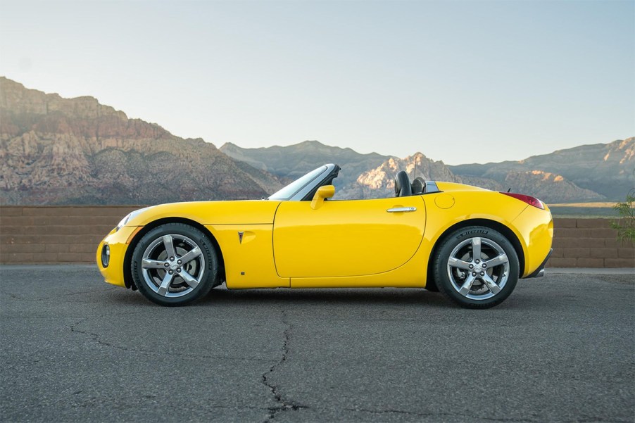 Yellow 2008 Pontiac Solstice GXP turbocharged convertible sports car sold on Cars and Bids for under $15,000