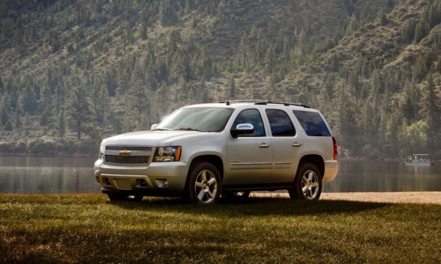 A 2013 Chevy Tahoe on display outside.