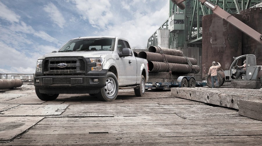 2015 Ford F-150 XL Single Cab Work Truck pulling a trailer