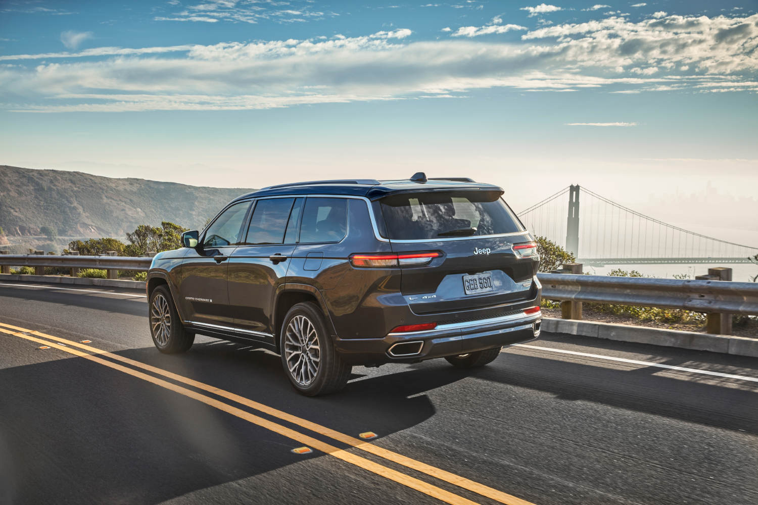 The 2023 Jeep Grand Cherokee L in front of a blue sky