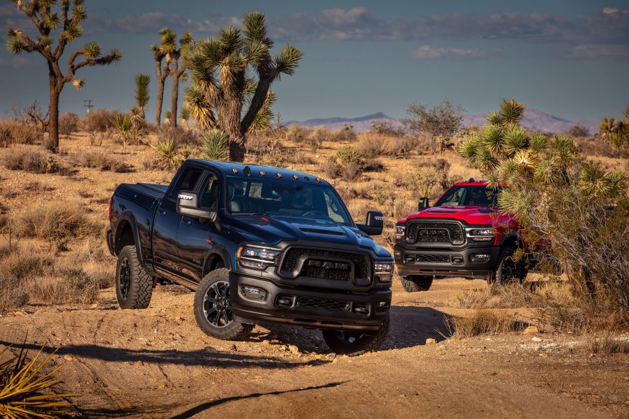 Two 2023 Ram 1500 Classic models off-roading in the desert