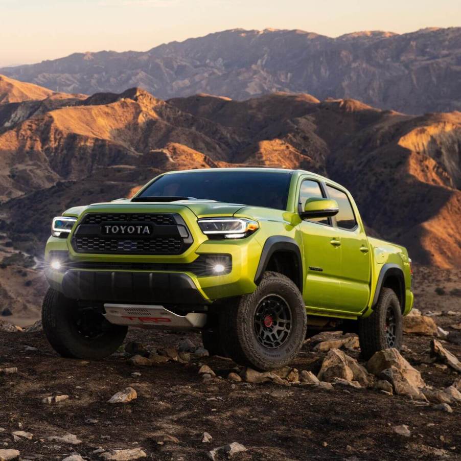 The 2023 Toyota Tacoma climbing over rocks