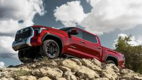 The 2023 Toyota Tundra climbing over rocks