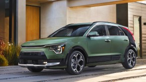 A green 2024 Kia Niro hybrid subcompact SUV.