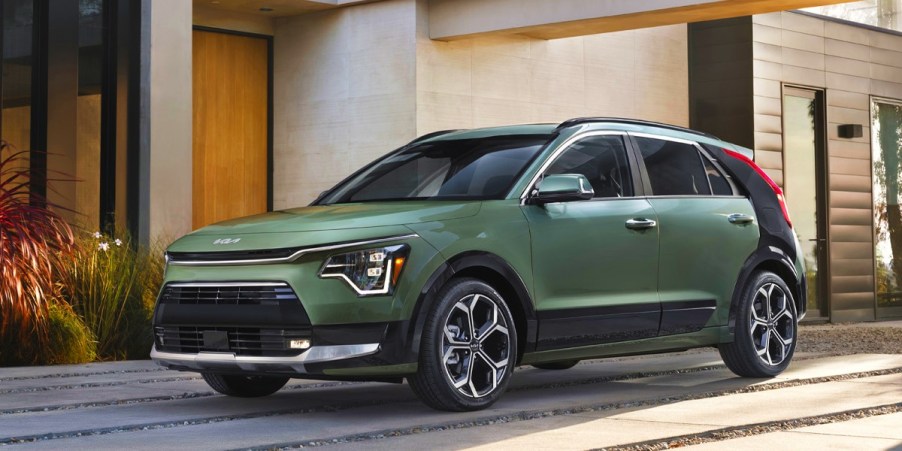 A green 2024 Kia Niro hybrid subcompact SUV.