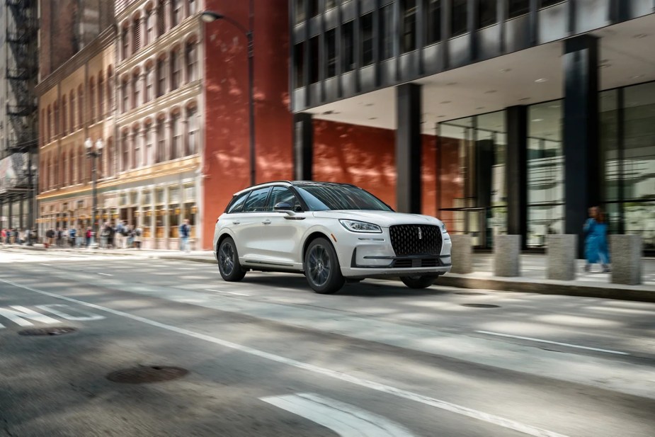 A white 2024 Lincoln Corsair compact SUV parked on the street