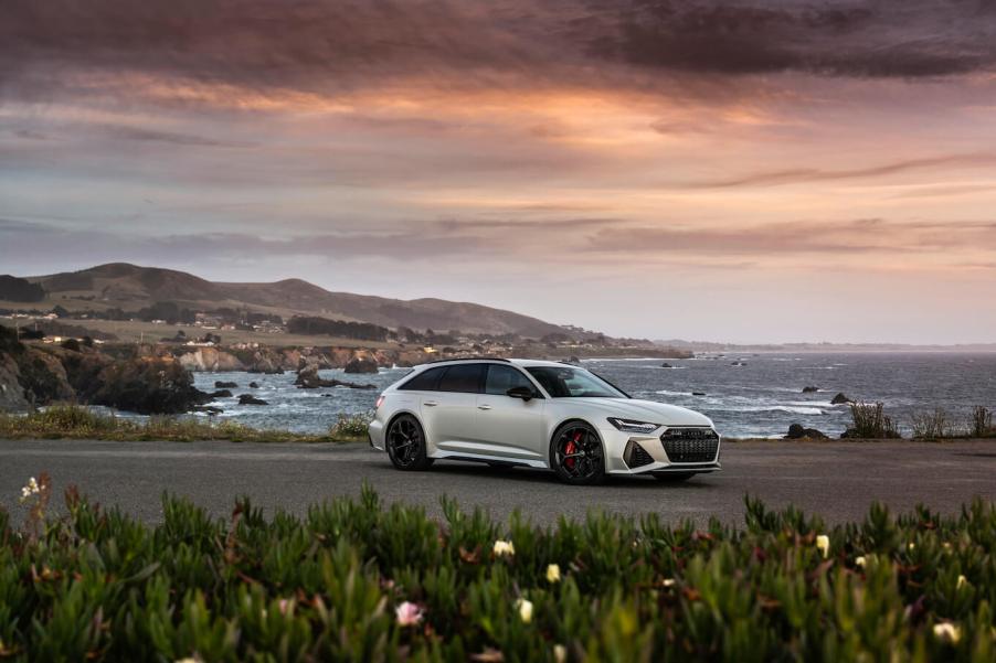 Wide shot of a 2024 Audi RS 6 Avant, price ranging well into $100K territory in white.