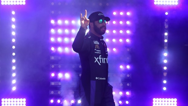 Bubba Wallace waves to fans