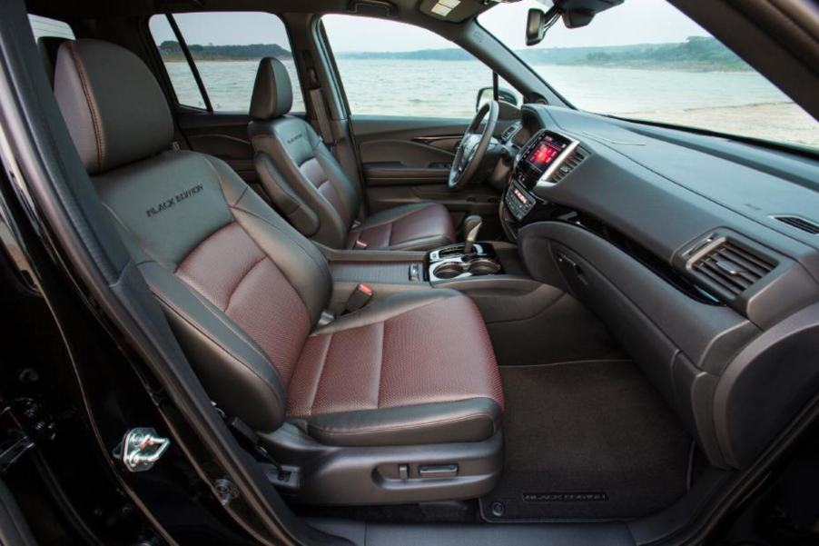 Black and brown leather interior of a 2018 black edition Honda Ridgeline truck