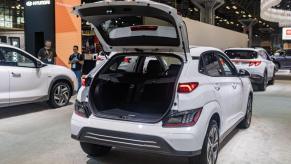 A Hyundai Kona Electric SUV model with an opened liftgate at the 2022 New York International Auto Show (NYIAS)