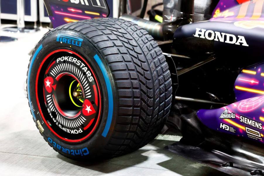 A Pirelli tire with Pokerstars advertising on a Honda F1 race car for the Las Vegas Grand Prix