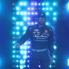 Martin Truex Jr. walks on stage.