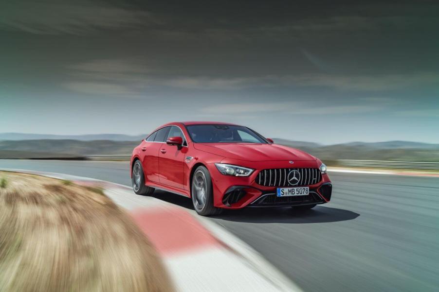 A Mercedes-AMG GT 63 S E Performance grant tourer coupe speeding on a country race track