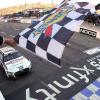 A waving checkered flag at the NASCAR Cup Series Xfinity 500 at Martinsville Speedway in Virginia