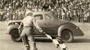 Red Byron wins the first race with the NASCAR name on Daytona Beach in Florida.