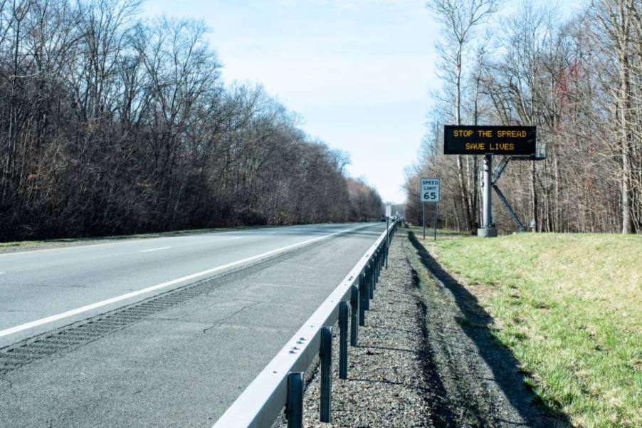 An empty interstate highway during the day.