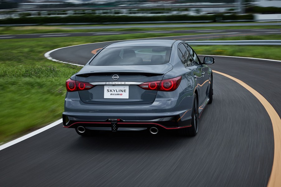 Rear fascia of the 2024 Nissan Skyline Nismo limited edition driving away from the camera on a windy road