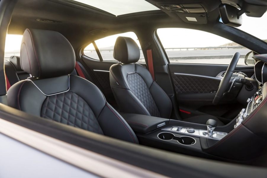 A 2023 Genesis G70, an AWD luxury car, shows off its handsome interior.