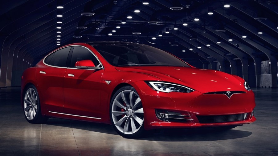 2023 Tesla Model S in dark auditorium