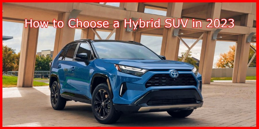 A blue 2024 Toyota RAV4 Hybrid small hybrid SUV is parked.