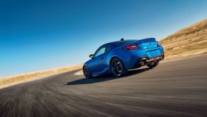 A 2024 Subaru BRZ sports car coupe with has rear-wheel drive (RWD) instead of Symmetrical all-wheel-drive (AWD)