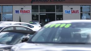 A finance sign at a dealership lot